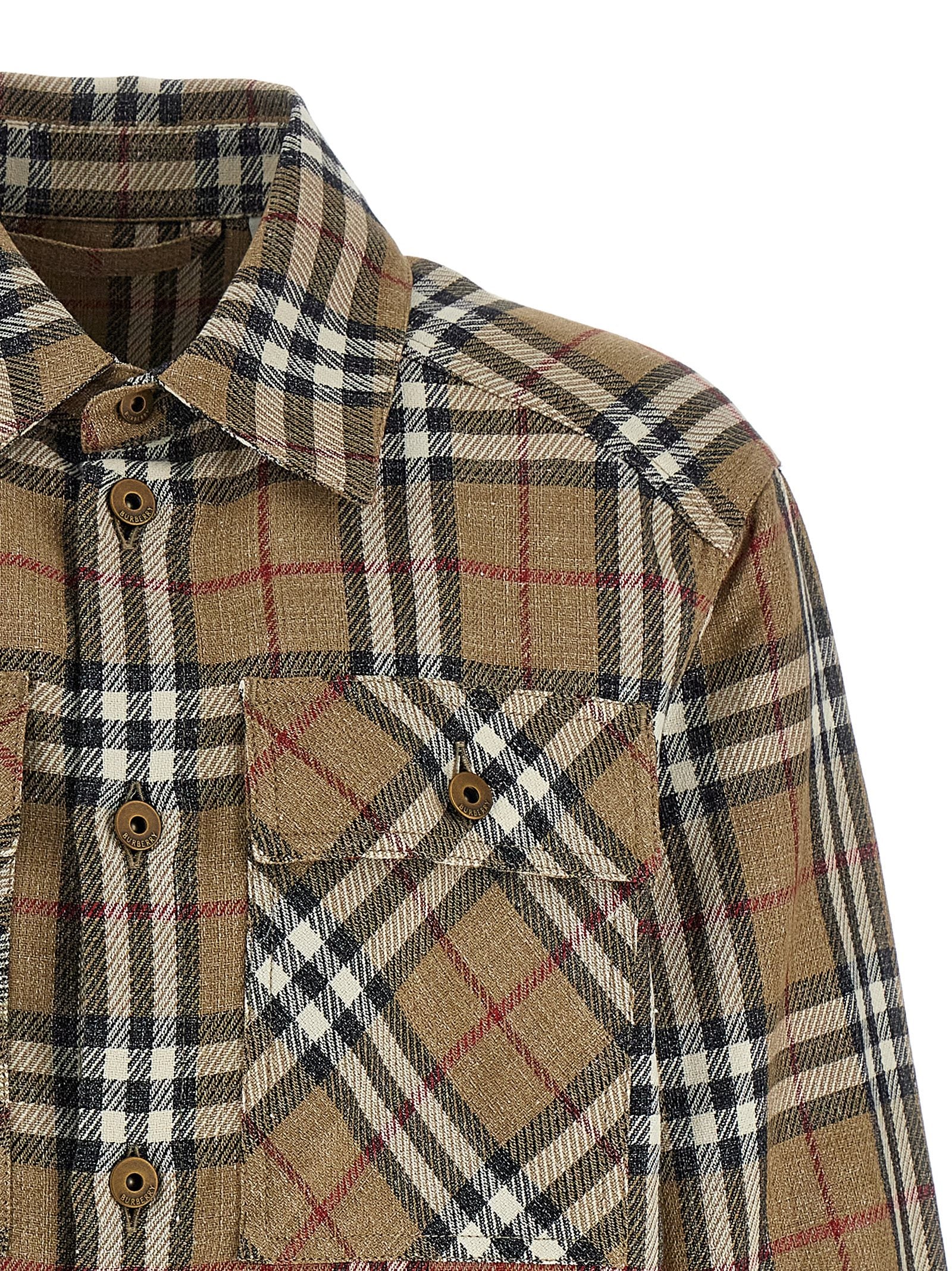 Elevate your wardrobe with the Burberry Brown Cotton Blouse, a luxurious blend of cotton and linen, embodying timeless elegance and sophisticated craftsmanship for discerning tastes.