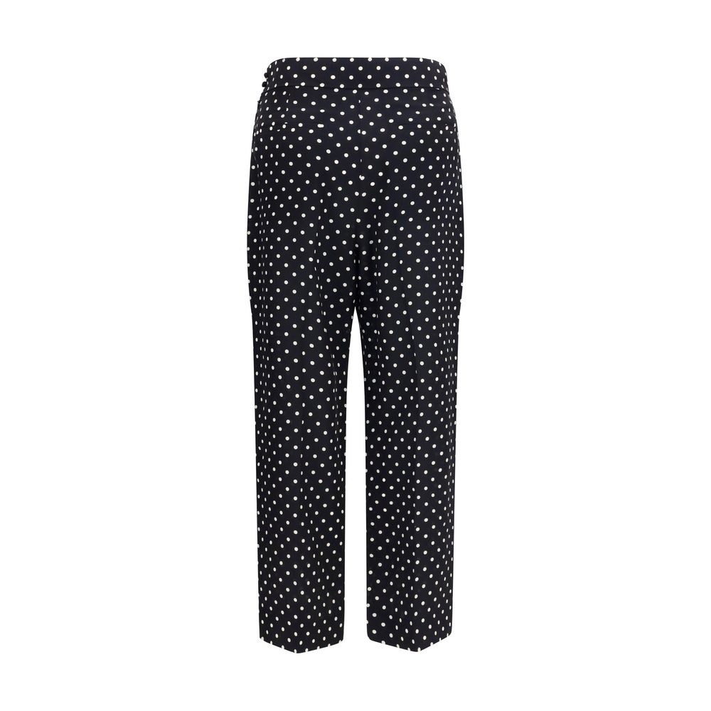 Indulge in the allure of Valentino Black Silk Cropped Pants, crafted from luxurious crêpe de chine, embodying timeless elegance for every sophisticated occasion.