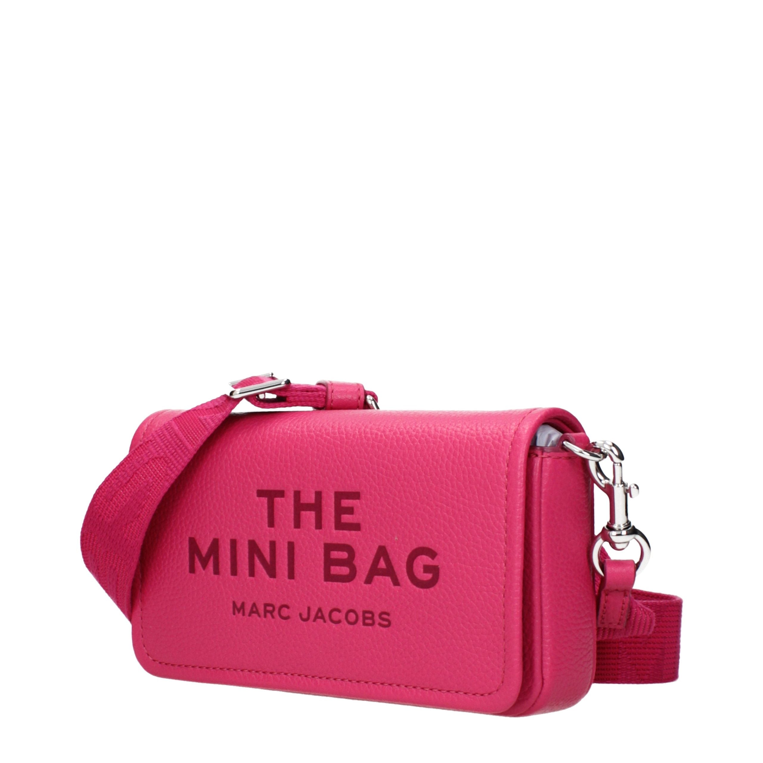 Discover the Marc Jacobs Pink Leather Crossbody Bag, a luxurious fusion of elegance and modernity, perfect for those who embody sophistication and style.