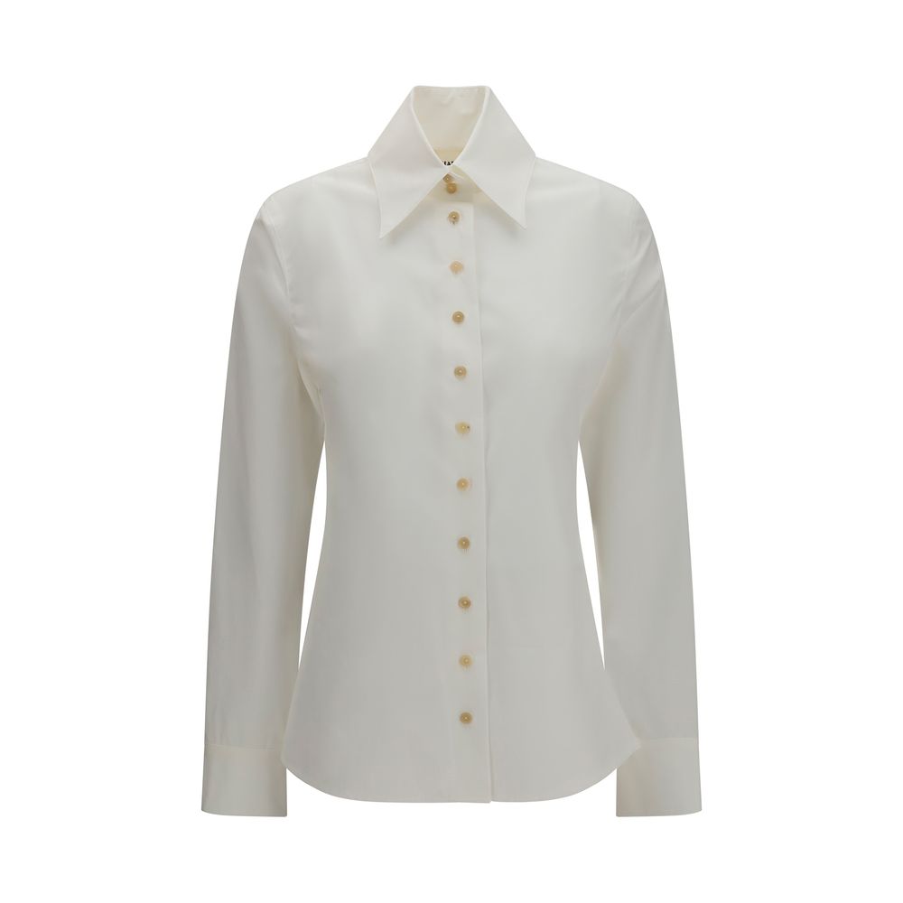 Elevate your wardrobe with the Khaite White Cotton Dress Shirt, a masterpiece of organic cotton poplin, embodying timeless elegance and sophisticated allure.