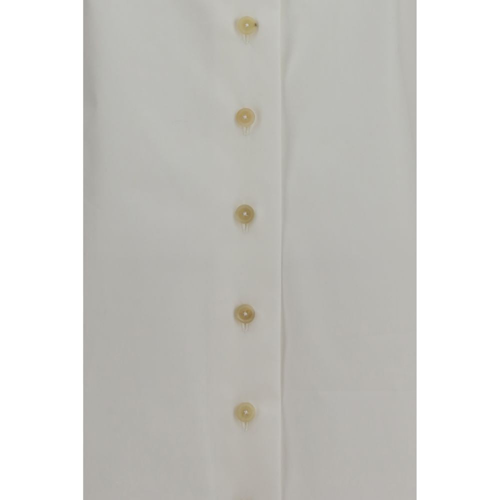 Discover the Khaite White Cotton Dress Shirt, a masterpiece of organic cotton poplin, embodying timeless elegance and sophisticated allure for the discerning individual.