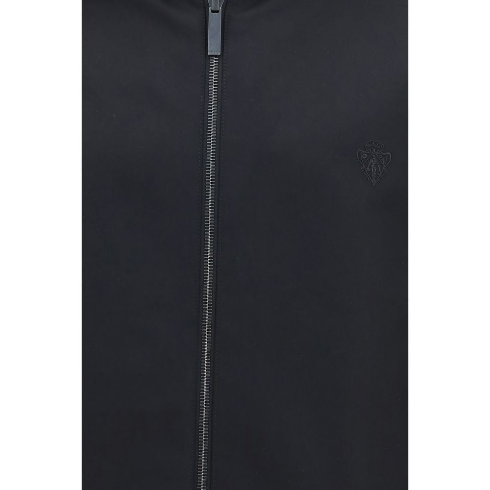 Elevate your style with the Gucci Black Polyester Bomber, a reversible masterpiece of luxury and versatility, crafted for those who embrace sophistication and timeless elegance.