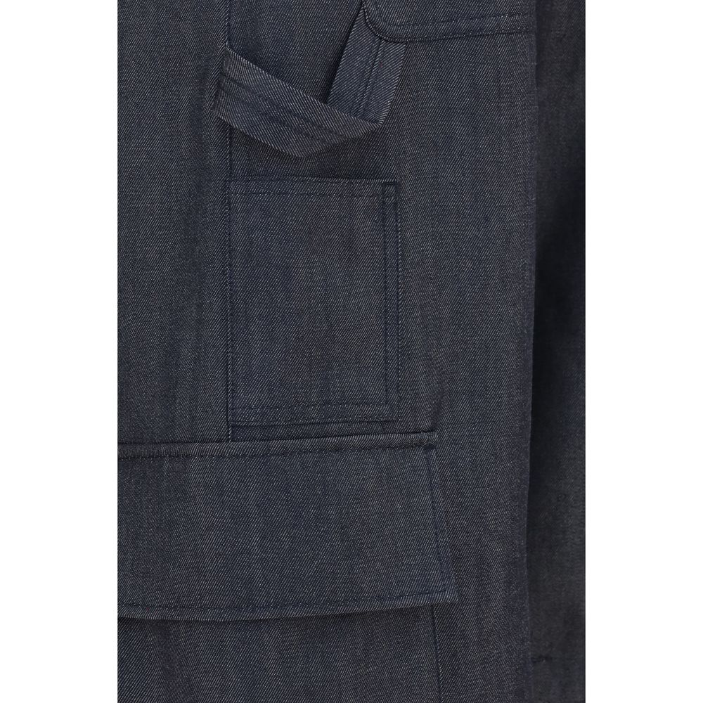 Elevate your wardrobe with Balenciaga Blue Wool Oves Aries Cargo Pants, crafted from luxurious 100% Wool Ovis Aries, merging timeless elegance with modern utility.