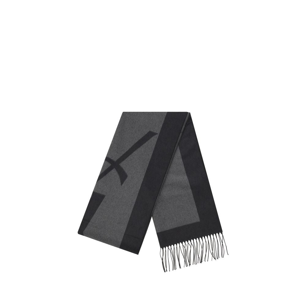 Elevate your style with the Saint Laurent Gray Silk Scarf, a luxurious accessory crafted from 100% silk, embodying timeless sophistication and refined elegance.