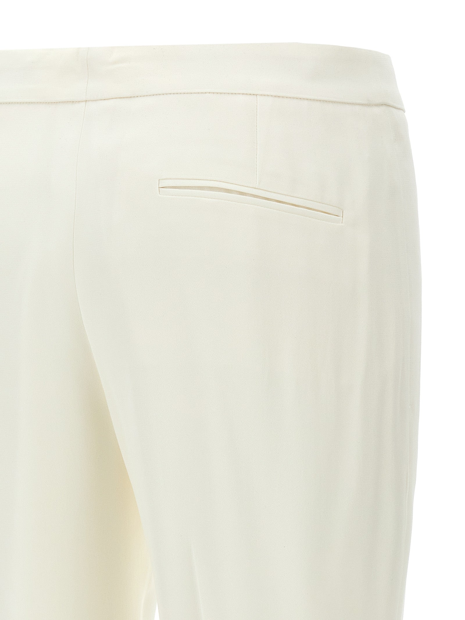 Elevate your wardrobe with the Alexander McQueen White Viscose Casual Pants, a luxurious blend of comfort and sophistication, perfect for the discerning individual.