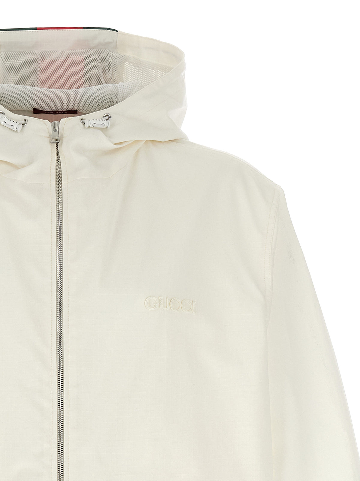 Discover the Gucci White Cotton Shell Jacket, a masterful blend of water-repellent luxury and minimalist design, perfect for the modern connoisseur.