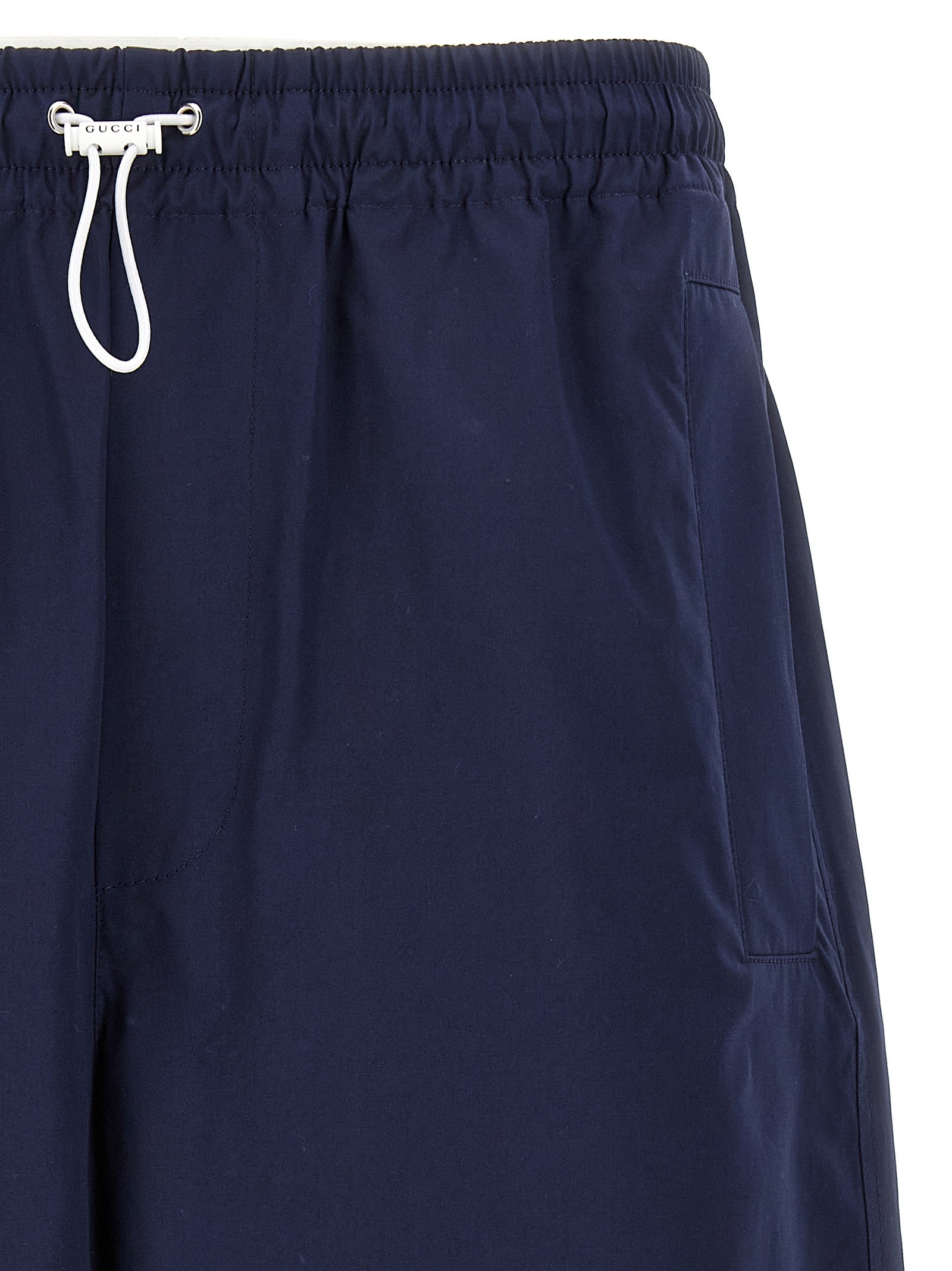 Elevate your summer wardrobe with Gucci Blue Cotton Bermuda Shorts, crafted from luxurious cotton for a relaxed fit that embodies sophistication and effortless style.