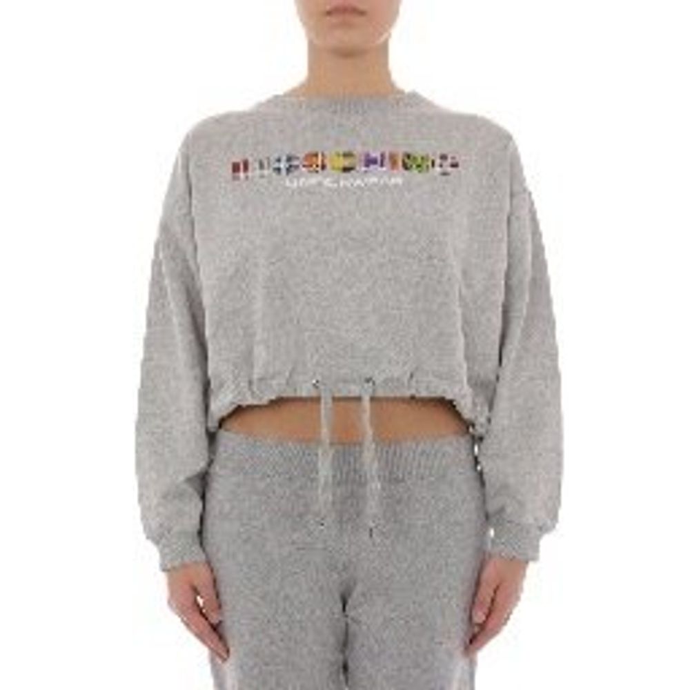 Experience the allure of the Moschino Gray Cotton Sweatshirt, where luxurious cotton embraces avant-garde design, perfect for those who embody sophistication and individuality.