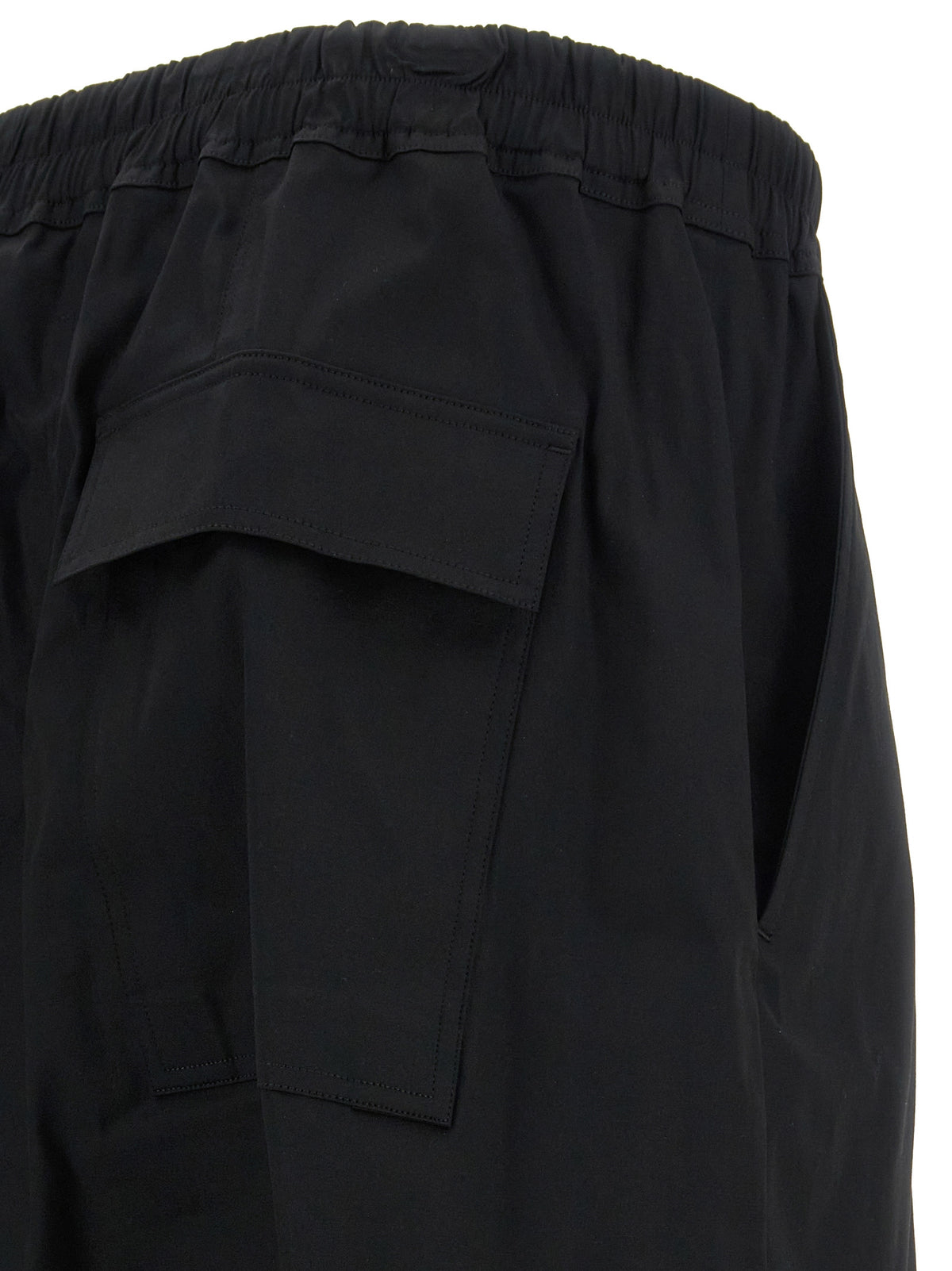 Discover the Rick Owens Black Cotton Casual Pants, a masterful blend of avant-garde design and luxurious comfort, perfect for the discerning individual who embraces urban chic.