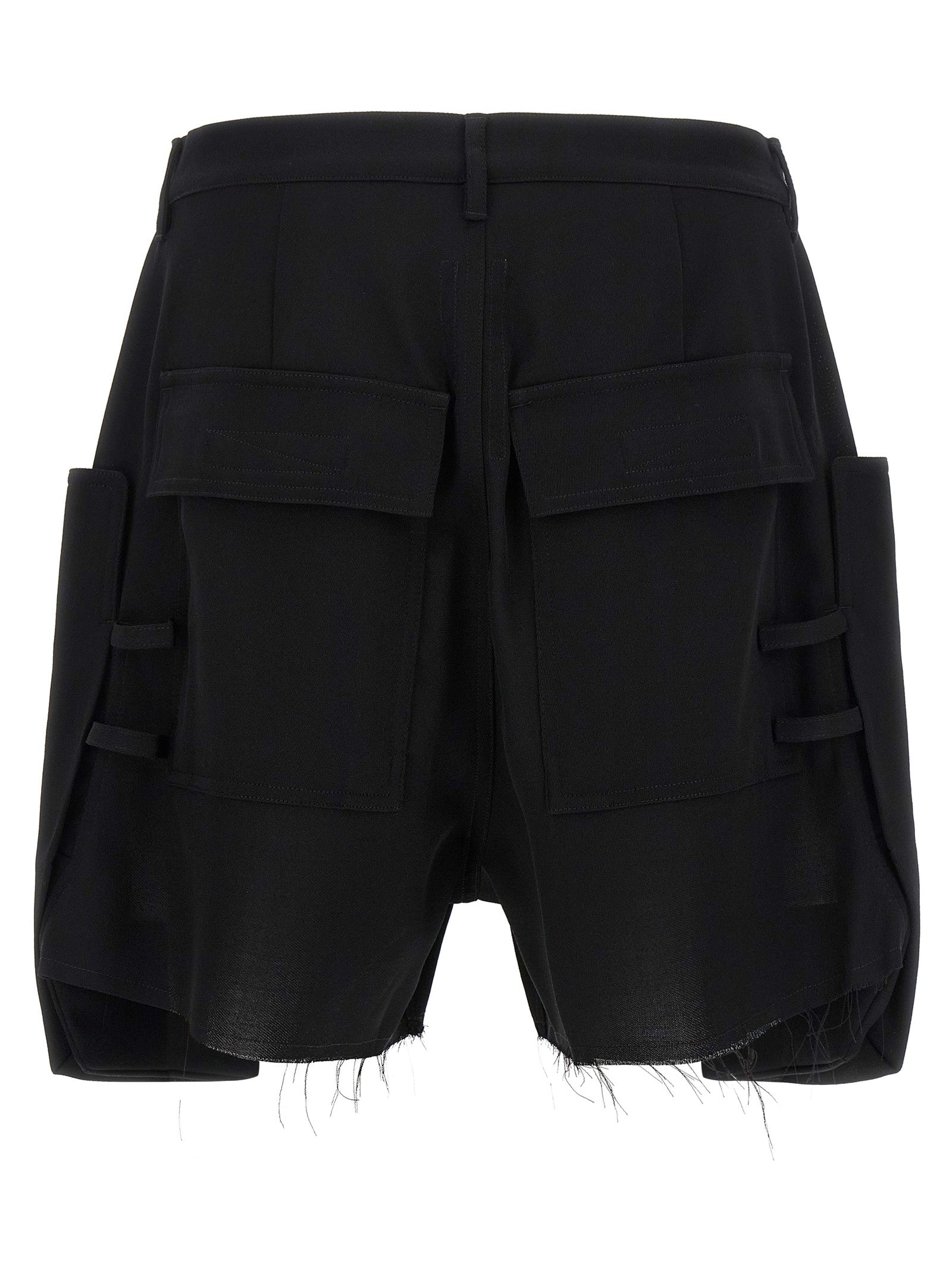 Experience the avant-garde allure of Rick Owens' Black Wool Bermuda Shorts, where luxurious craftsmanship meets bold design, perfect for the discerning individual.