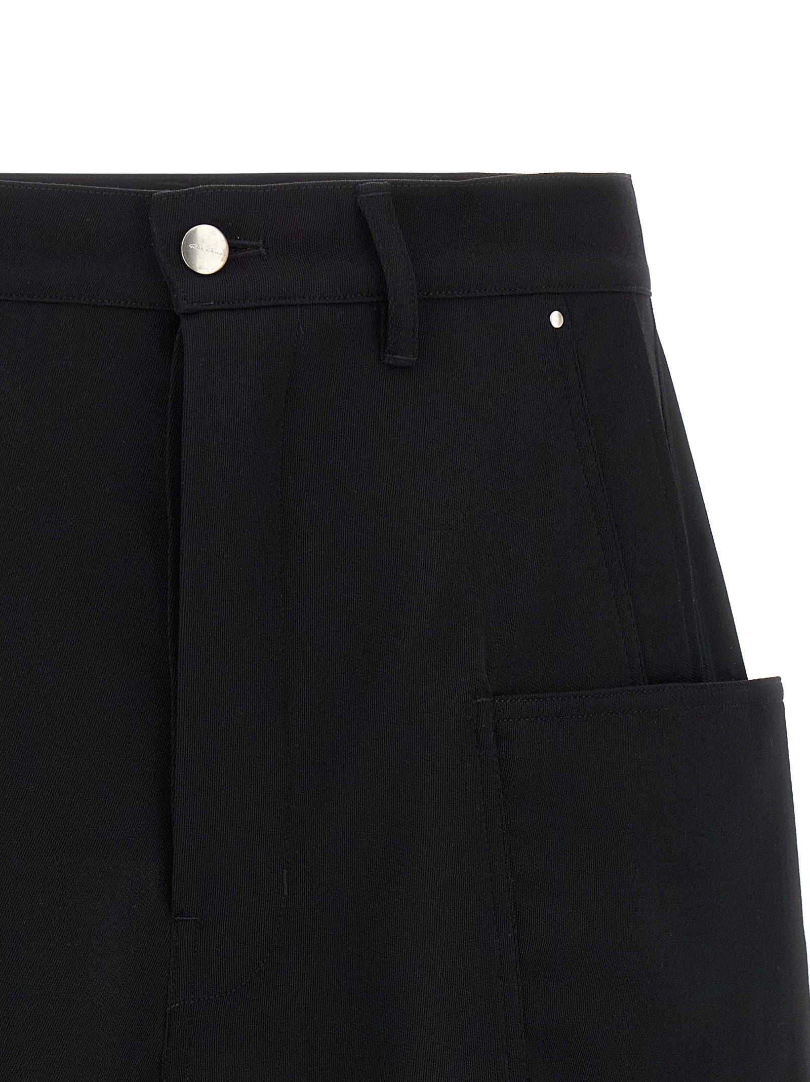 Elevate your wardrobe with Rick Owens Black Wool Bermuda Shorts, where avant-garde design meets luxurious craftsmanship, perfect for the discerning individual.