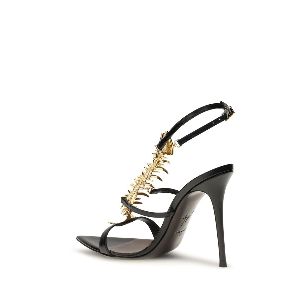 Step into a realm of opulence with Giuseppe Zanotti's Black Calf Leather Bos Taurus Stiletto Heel Sandals, where exquisite Italian craftsmanship meets bold elegance for unforgettable moments.