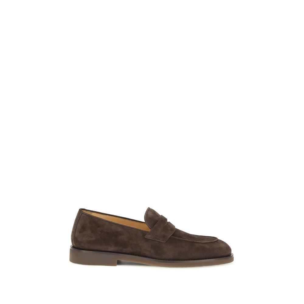 Discover the Brunello Cucinelli Brown Calf Leather Bos Taurus Slip-On Loafers, where exquisite craftsmanship meets timeless elegance, perfect for the discerning individual.
