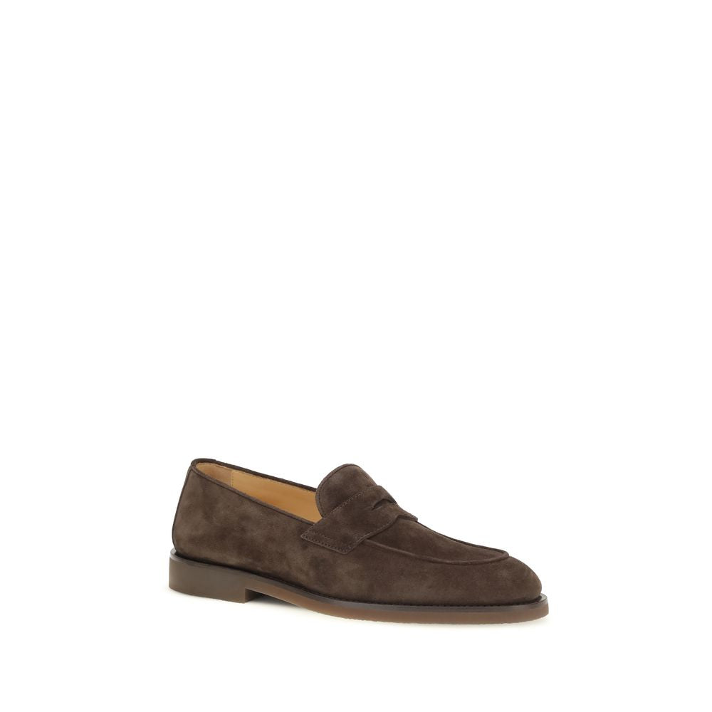 Indulge in the timeless elegance of Brunello Cucinelli's Brown Calf Leather Bos Taurus Slip-On Loafers, crafted for those who appreciate refined luxury and effortless style.
