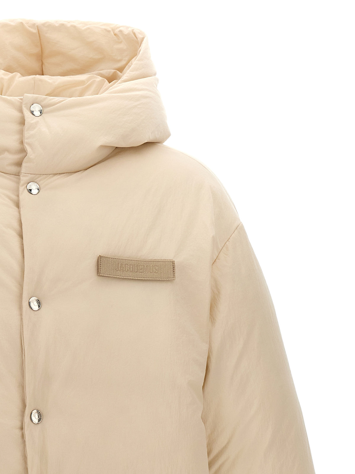 Discover the Jacquemus White Polyamide Full-Length Jacket, a masterpiece of French craftsmanship that embodies luxury and sophistication for the discerning individual.