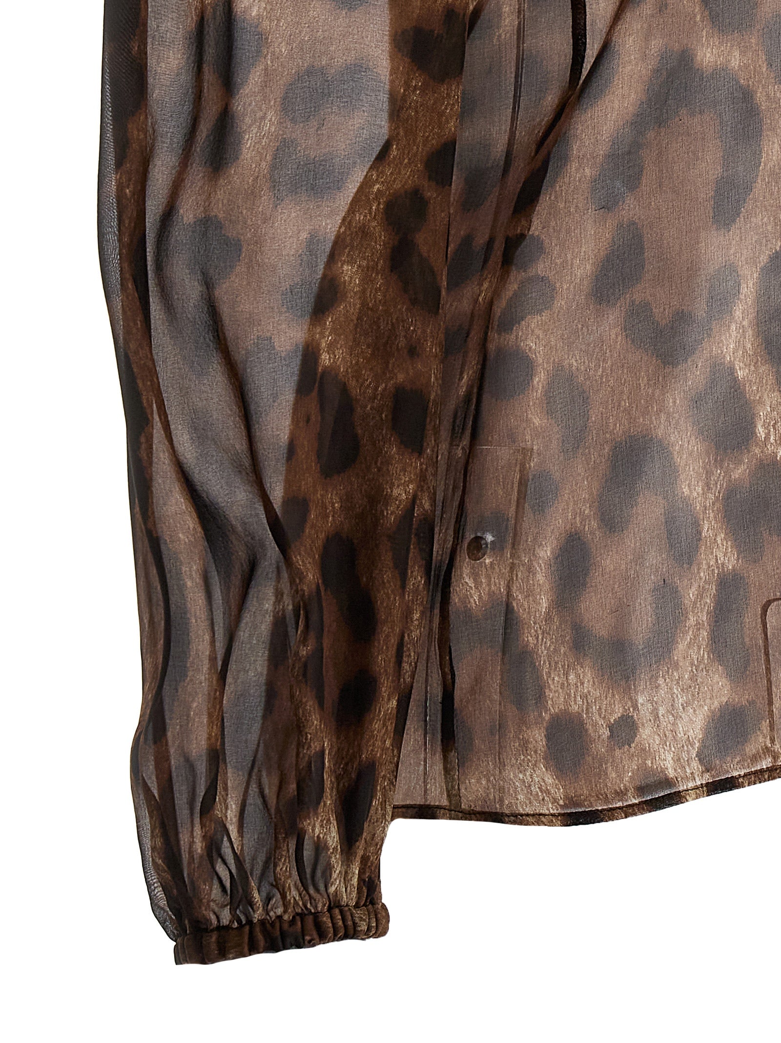 Discover the exquisite allure of the Dolce & Gabbana Multicolor Silk Blouse, a luxurious statement piece crafted from fine silk, perfect for the discerning individual.