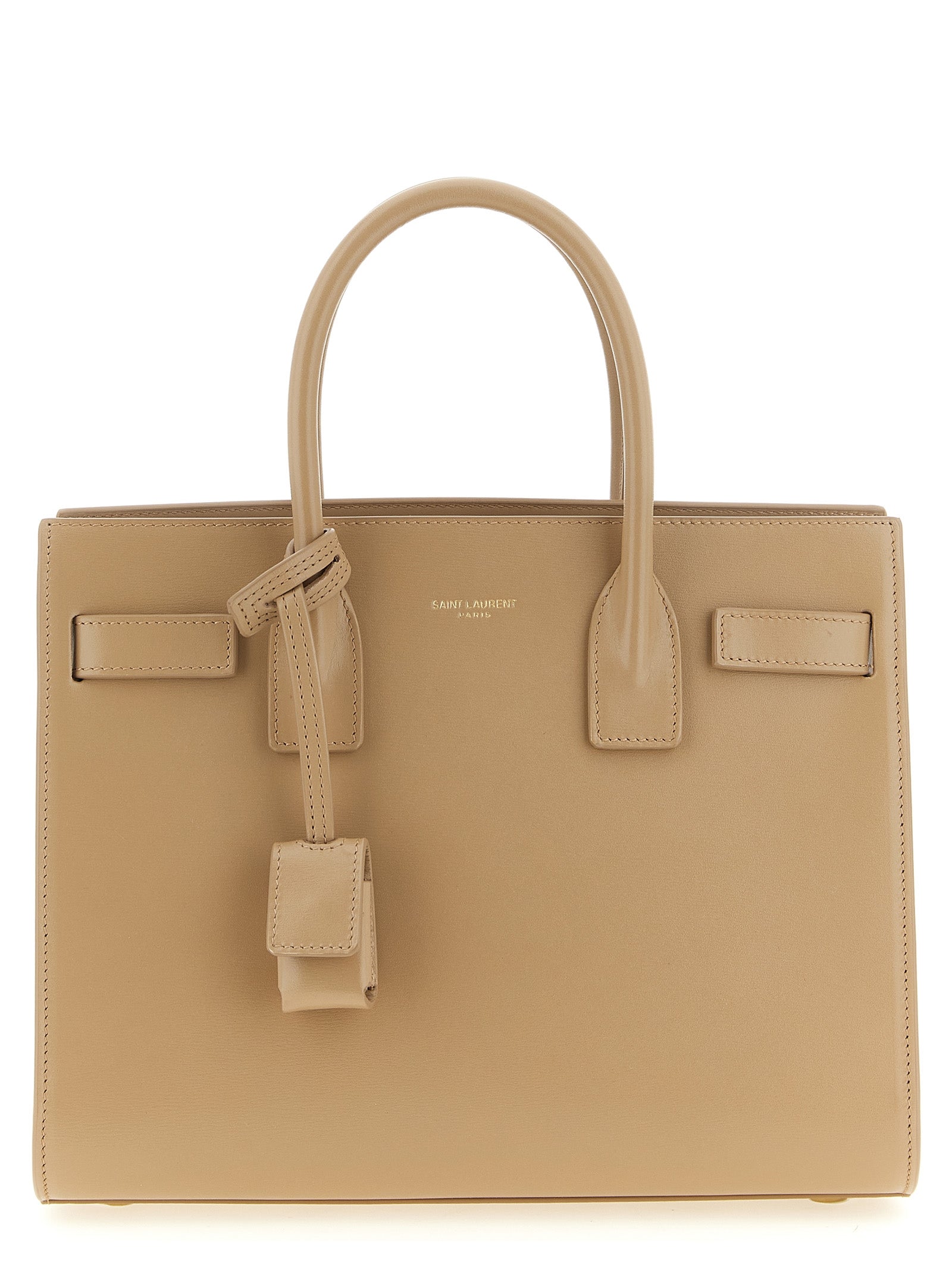 Indulge in the exquisite craftsmanship of the Saint Laurent Beige Calfskin Handbag, a timeless accessory that embodies luxury and sophistication for every discerning individual.