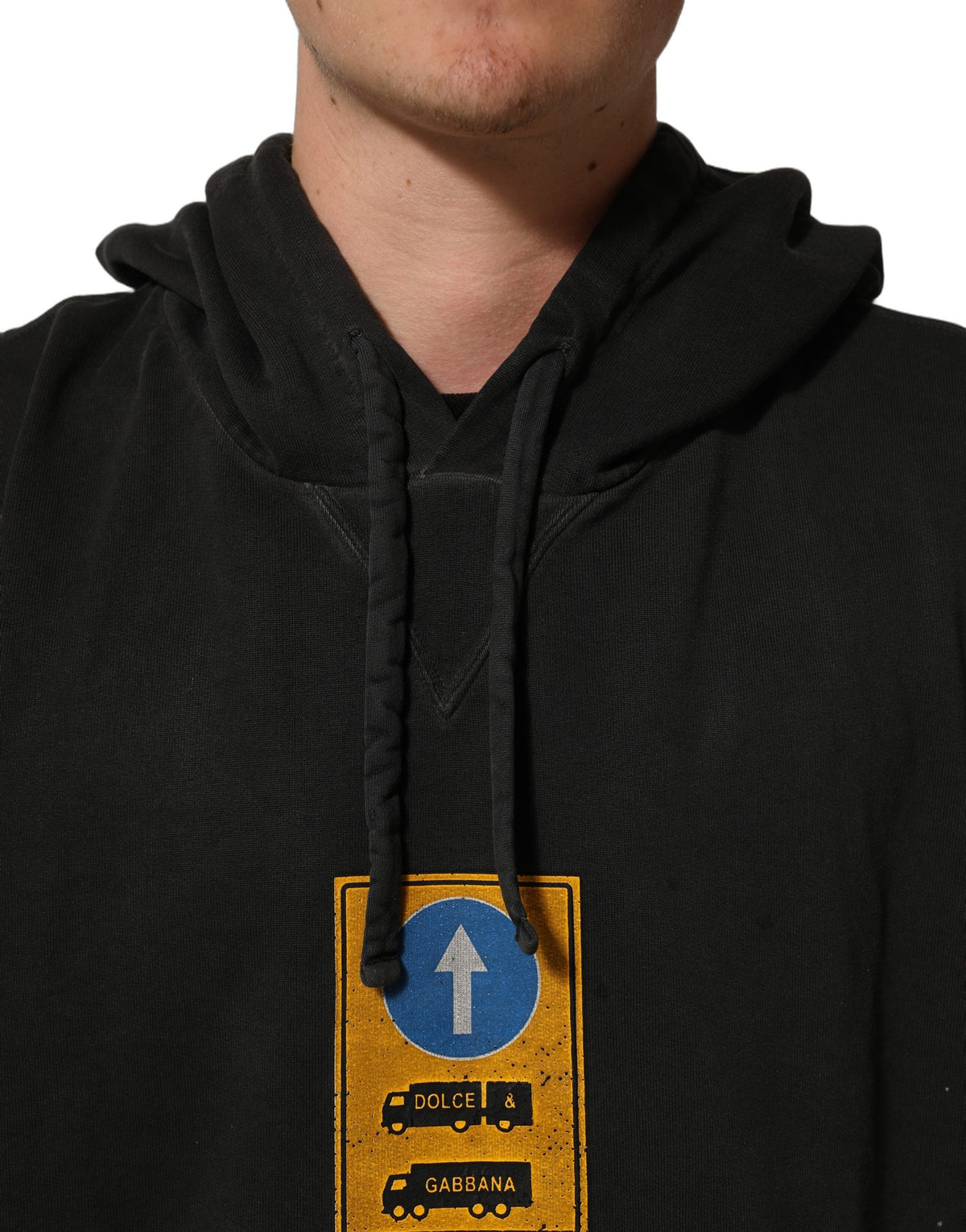 Discover the Dolce & Gabbana Black Cotton Logo Hooded Oversize Sweater, a luxurious blend of comfort and elegance, embodying exquisite Italian craftsmanship for the discerning style connoisseur.