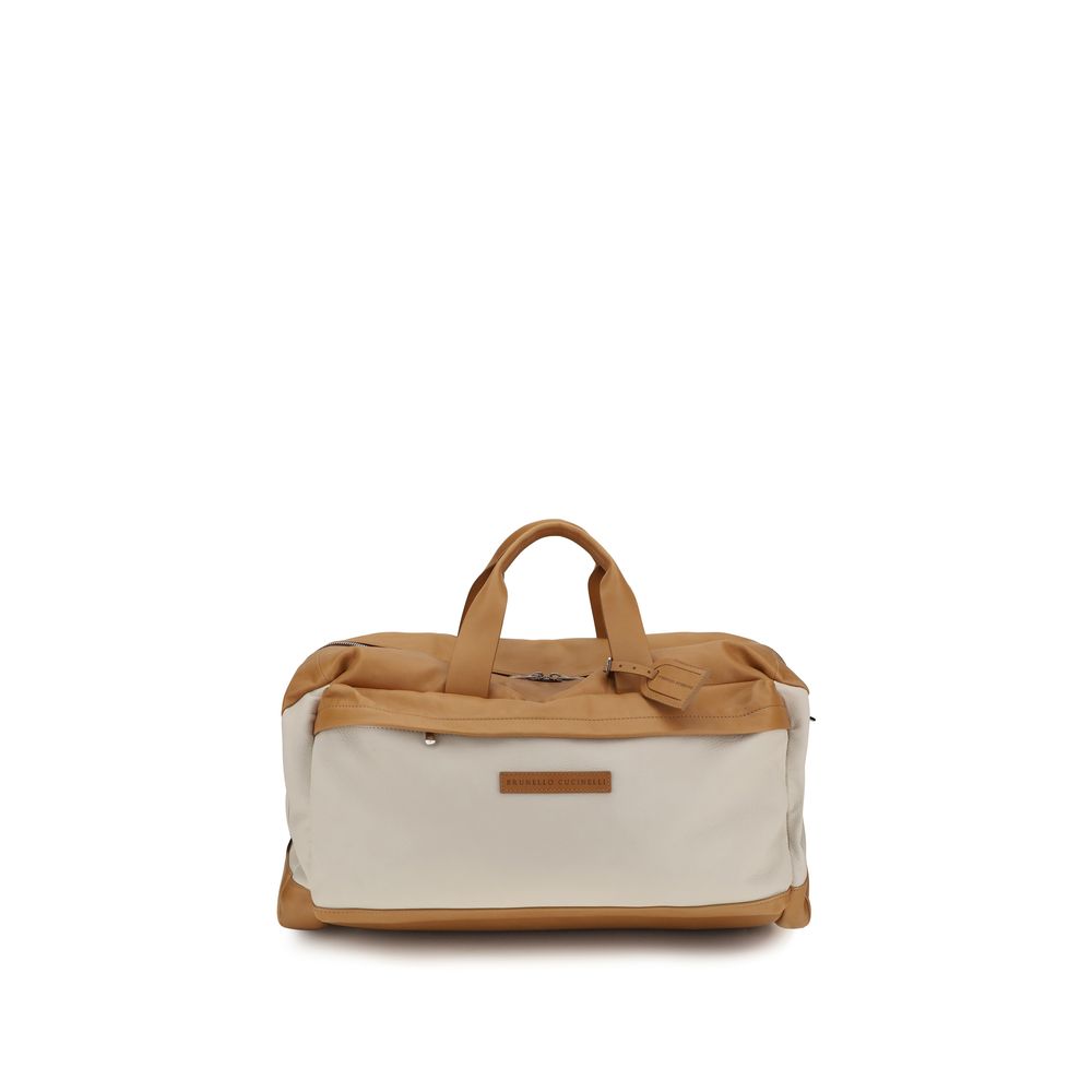Elevate your travel experience with the Brunello Cucinelli Beige Calf Leather Active Travel Bag, a blend of exquisite craftsmanship and timeless elegance for the discerning traveler.
