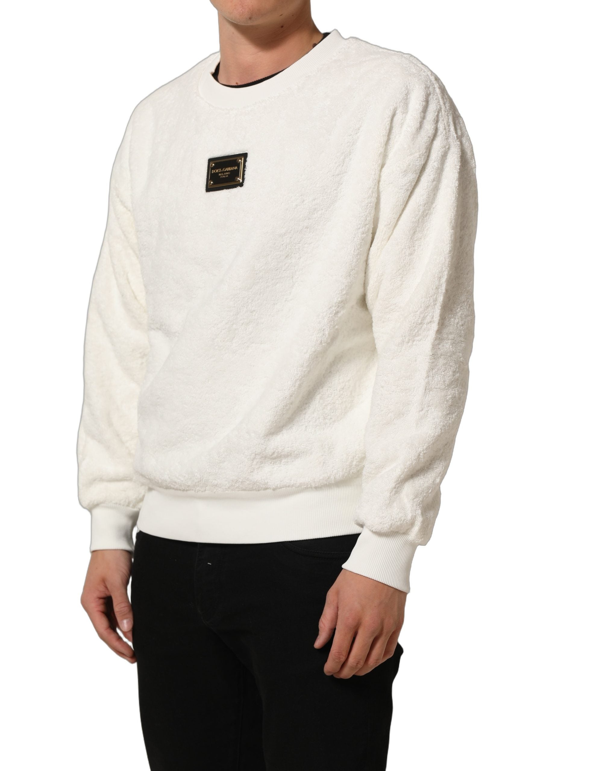 Elevate your style with the Dolce & Gabbana White LogoPlaque CrewNeck Sweatshirt, a luxurious blend of comfort and sophistication, crafted in Italy from 100% cotton.