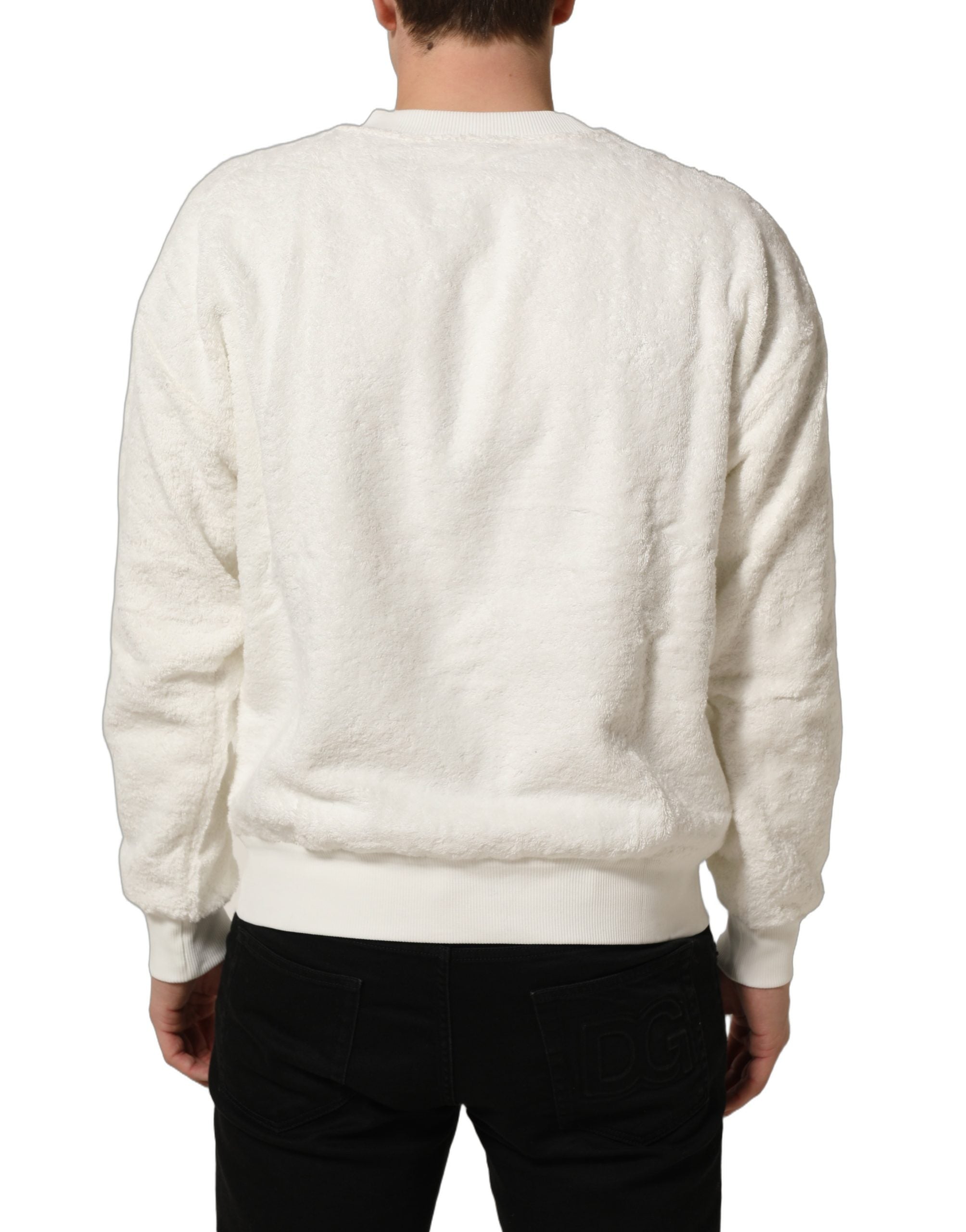 Elevate your wardrobe with the Dolce & Gabbana White LogoPlaque CrewNeck Sweatshirt, crafted from luxurious cotton, embodying sophistication and Italian artistry for the discerning individual.