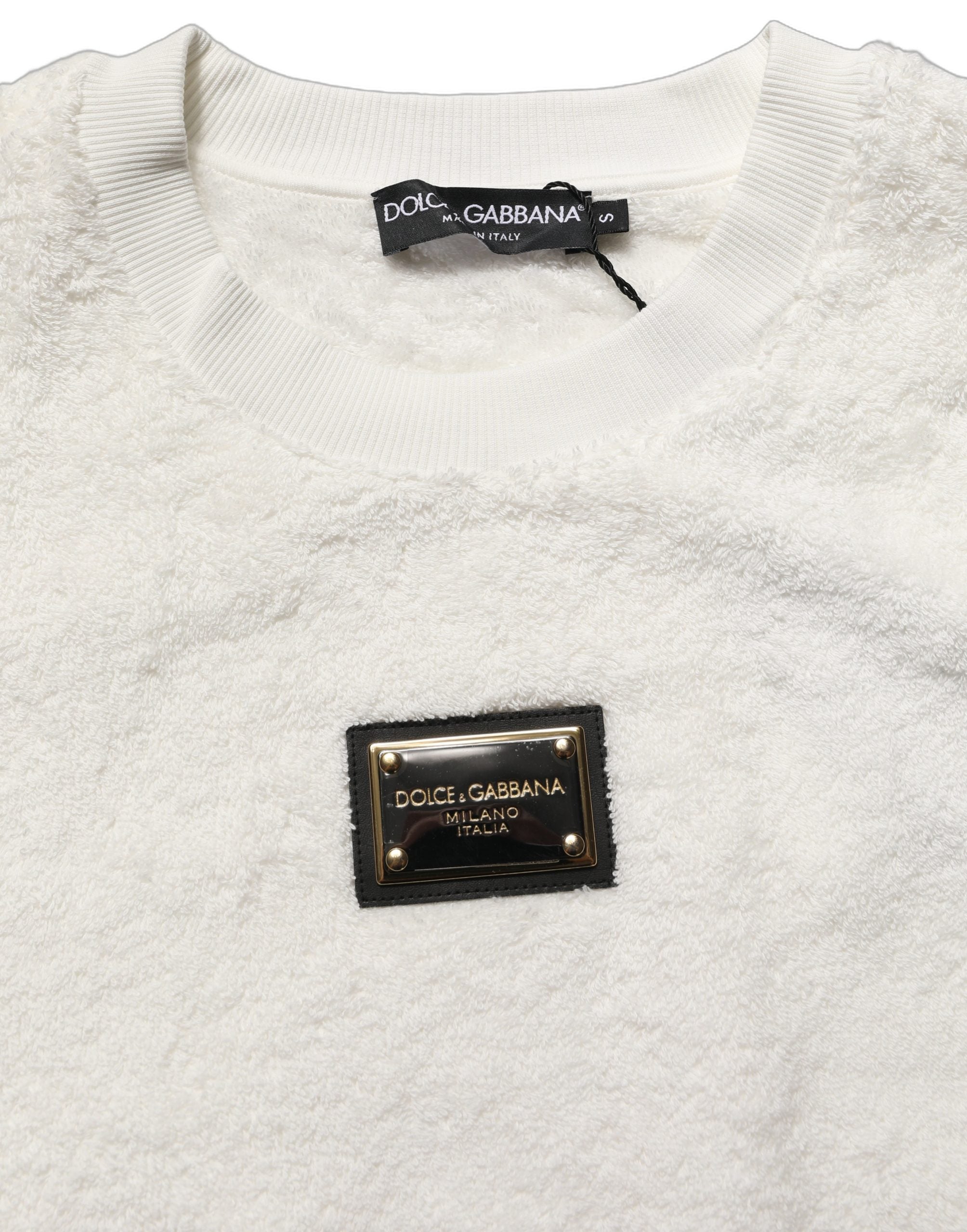 Elevate your wardrobe with the Dolce & Gabbana White LogoPlaque CrewNeck Sweatshirt, crafted from luxurious cotton in Italy, embodying sophistication and timeless elegance.