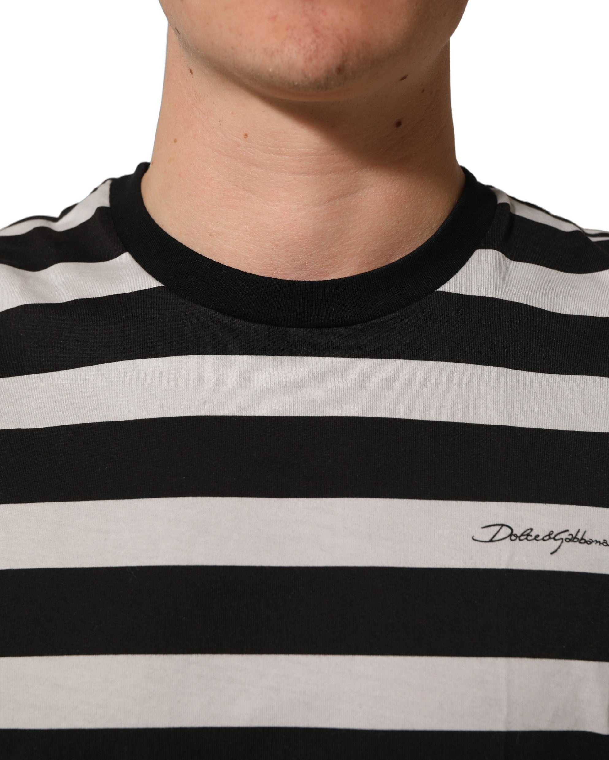 Elevate your style with the Dolce & Gabbana Black White Stripes Cotton Sleeveless T-shirt, a testament to Italian craftsmanship and timeless elegance for the discerning individual.
