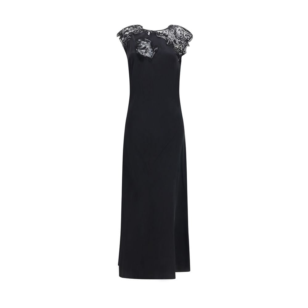 Experience the allure of the Ferragamo Black Silk Cocktail Dress, a masterpiece of 100% silk and exquisite lace, designed for those who embody elegance and sophistication.