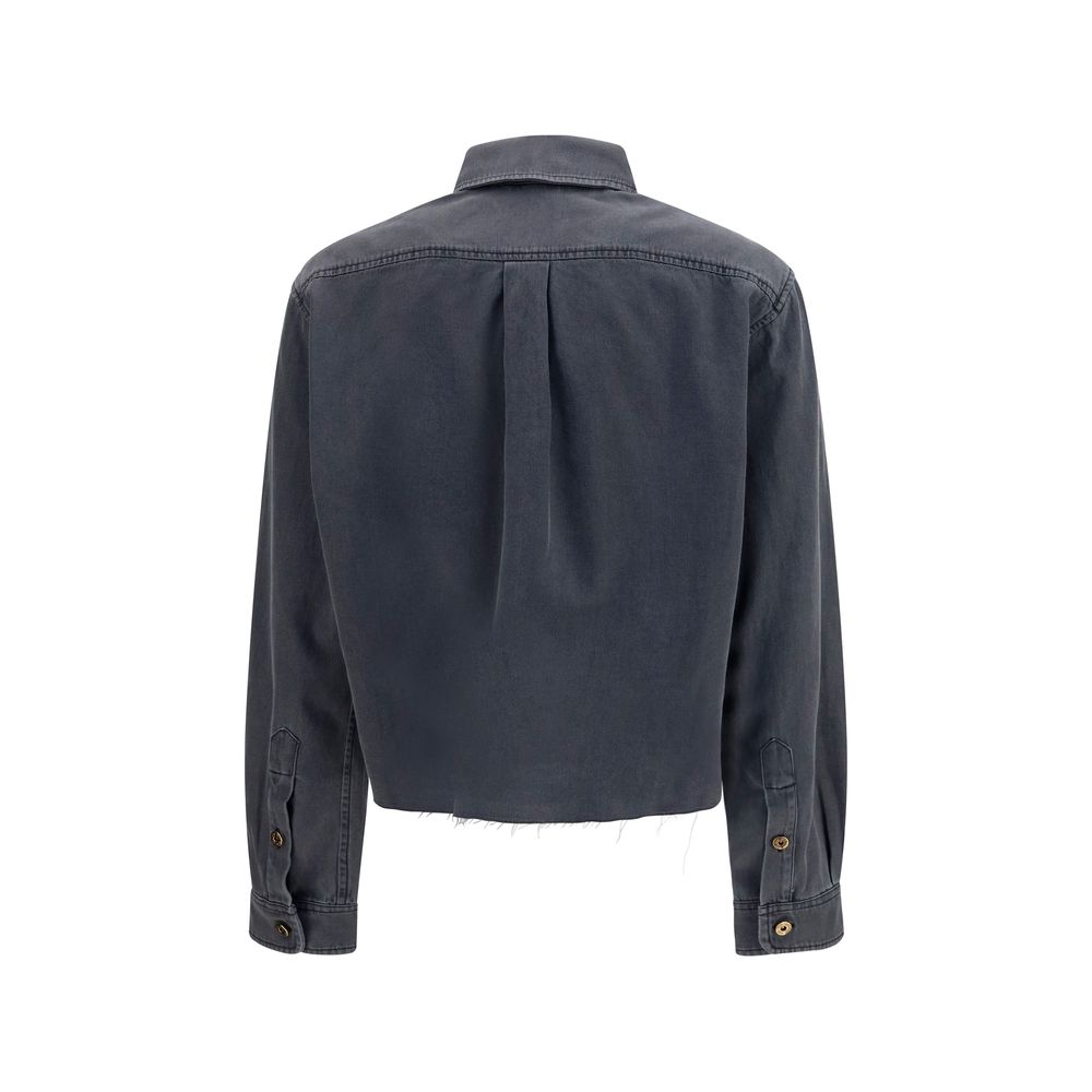 Experience the allure of the Miu Miu Gray Denim Shirt, crafted from luxurious cotton, embodying contemporary elegance for the discerning individual.