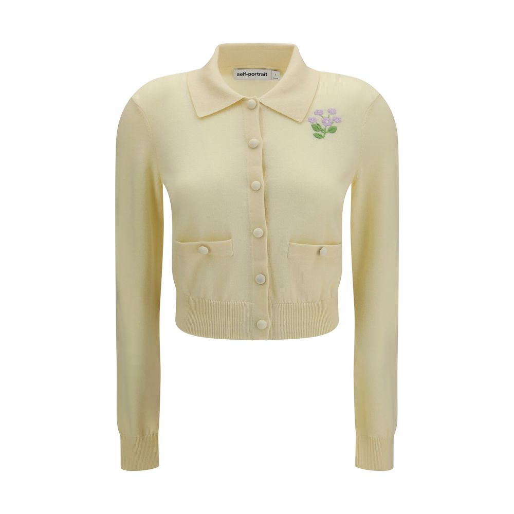 Elevate your wardrobe with the Self-Portrait Bicolor Wool Oves Aries Cardigan, a luxurious blend of 100% wool and delicate floral embroidery, perfect for sophisticated elegance.