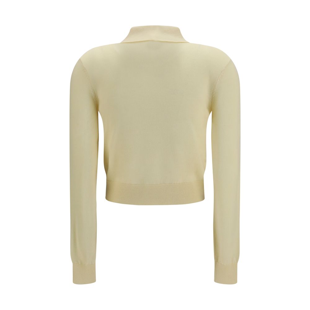 Elevate your style with the Self-Portrait Bicolor Wool Oves Aries Cardigan, crafted from luxurious 100% Wool Ovis Aries, adorned with delicate floral embroidery for timeless elegance.
