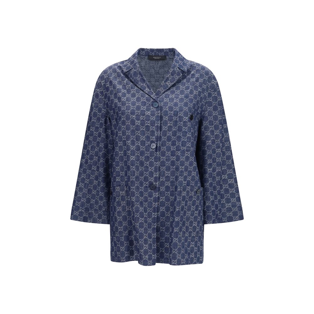 Experience the timeless elegance of the Gucci Blue Cotton Full-Length Jacket, crafted from luxurious GG jacquard cotton, perfect for sophisticated occasions.