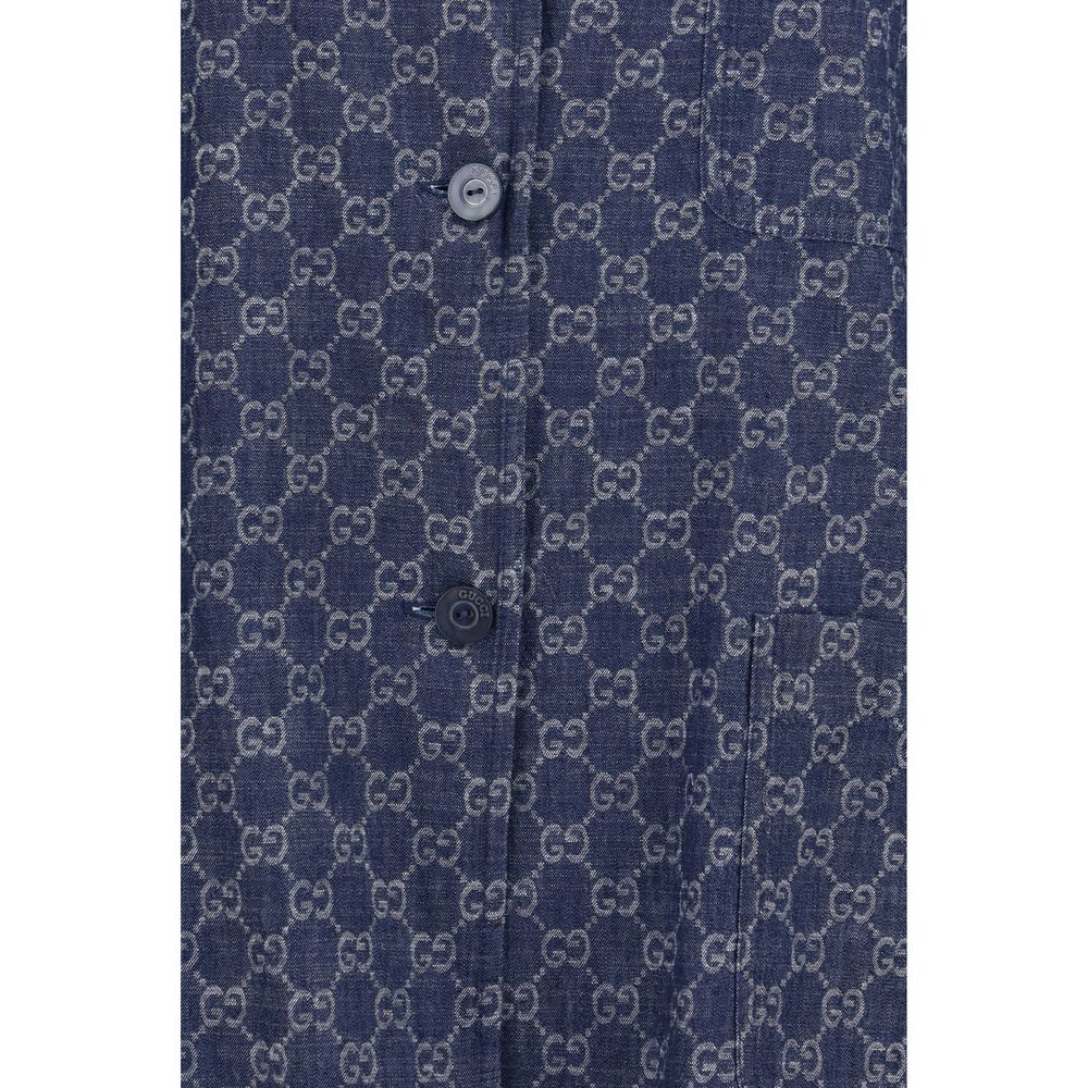 Elevate your wardrobe with the Gucci Blue Cotton Full-Length Jacket, a luxurious GG jacquard masterpiece that embodies timeless elegance and modern sophistication.