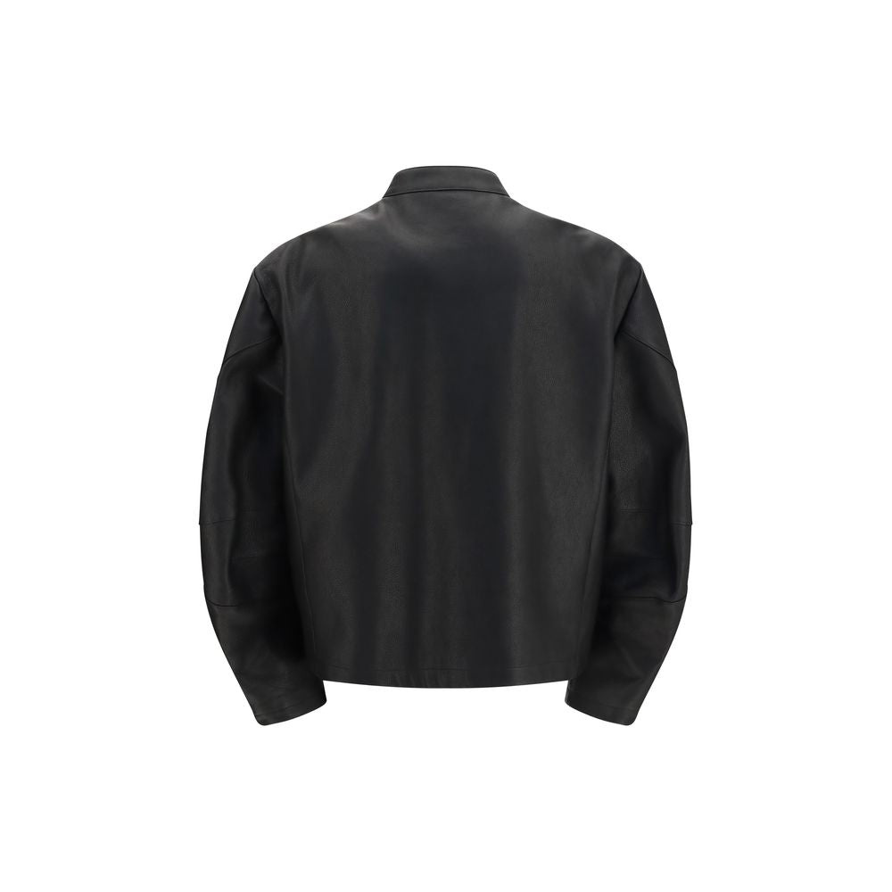 Experience the allure of the Gucci Black Calf Leather Bos Taurus Biker Jacket, a masterpiece of luxurious craftsmanship that redefines elegance and adventure.