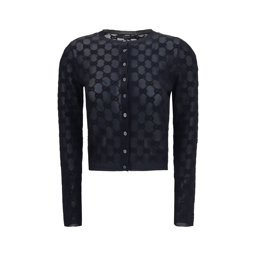 Indulge in the timeless elegance of the Gucci Black Viscose Cardigan, crafted from fine viscose crepe and bouclé cotton, a luxurious statement for any refined wardrobe.