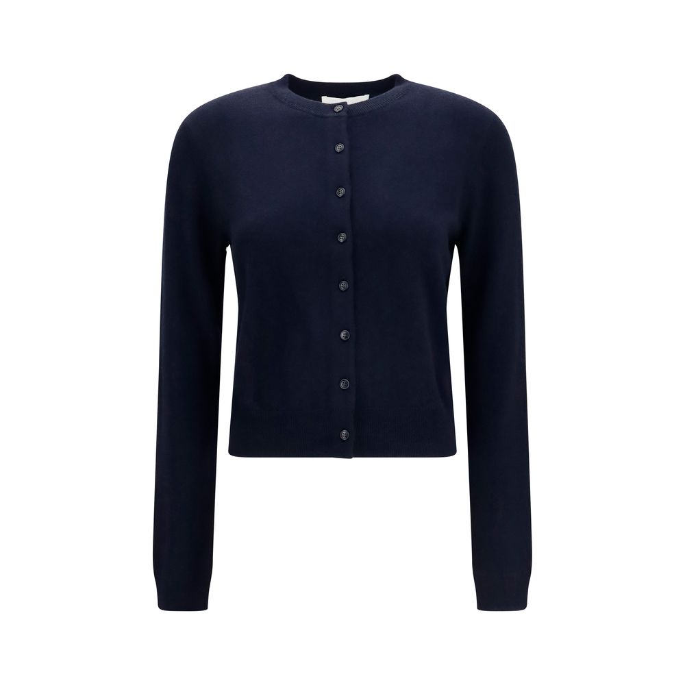 Indulge in the exquisite Lisa Yang Blue Cashmere Cardigan, a timeless luxury essential crafted from 100% cashmere, perfect for elevating any sophisticated wardrobe.