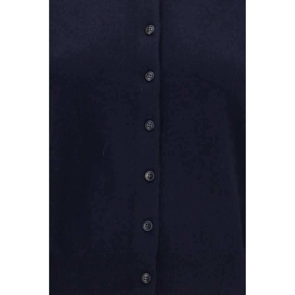 Elevate your wardrobe with the Lisa Yang Blue Cashmere Cardigan, a timeless luxury piece crafted from 100% cashmere, perfect for sophisticated layering and effortless elegance.