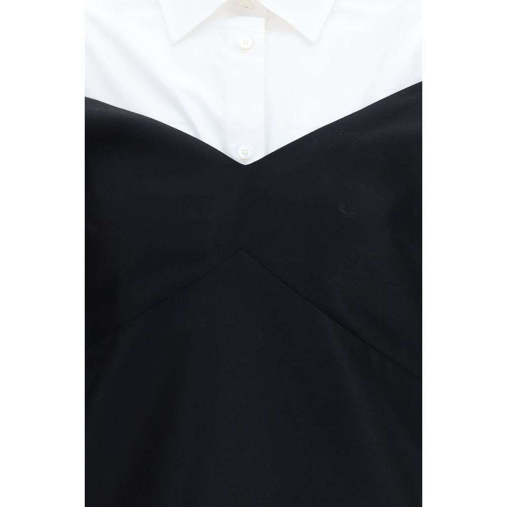 Experience the allure of Balenciaga's Black Wool Oves Aries Casual Dress, a luxurious blend of Merino wool and silk, embodying timeless elegance and innovative design.