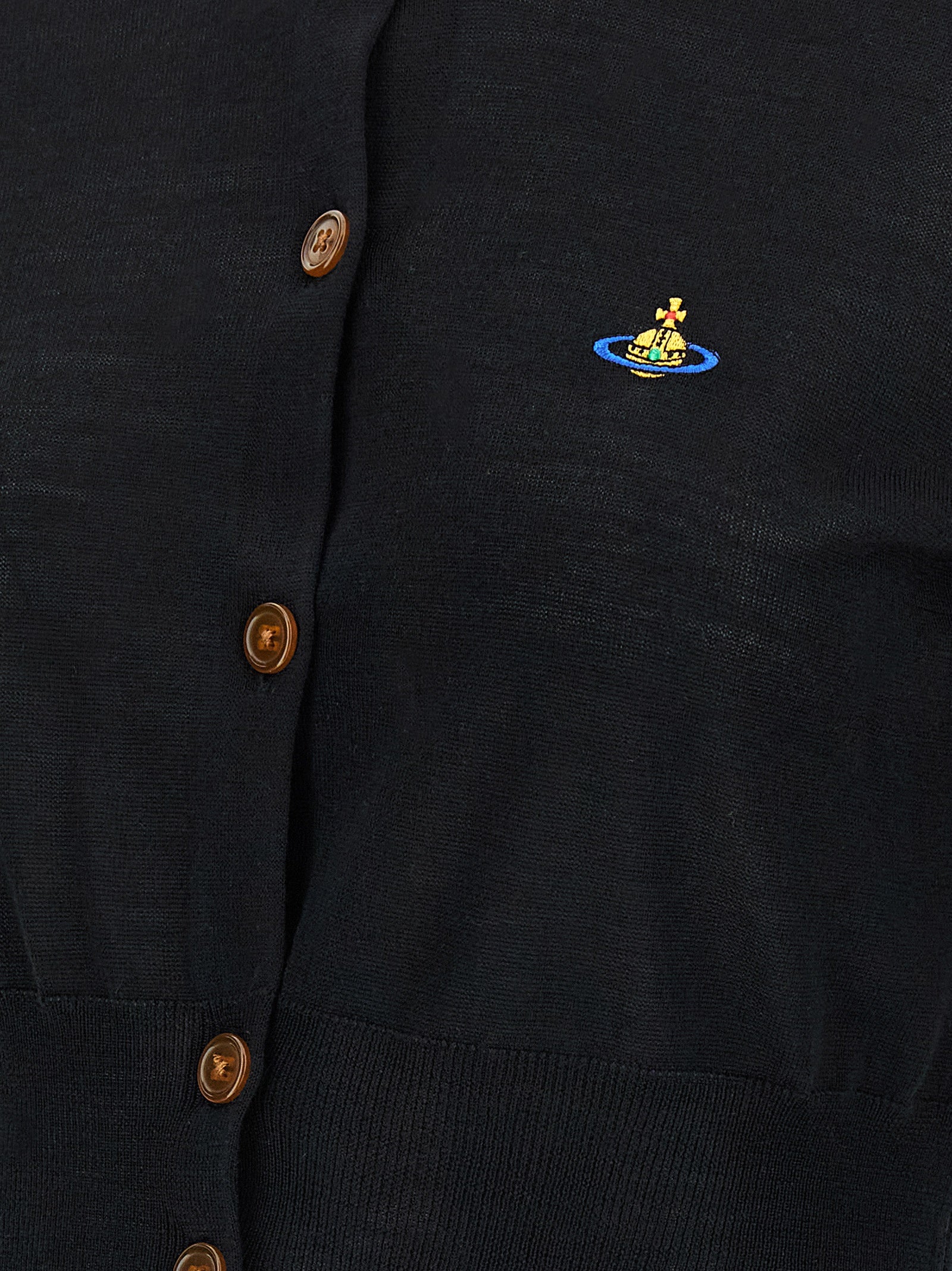 Discover the Vivienne Westwood Black Cotton Cardigan, a masterpiece of sustainable luxury, embodying timeless elegance and sophisticated allure for the discerning individual.