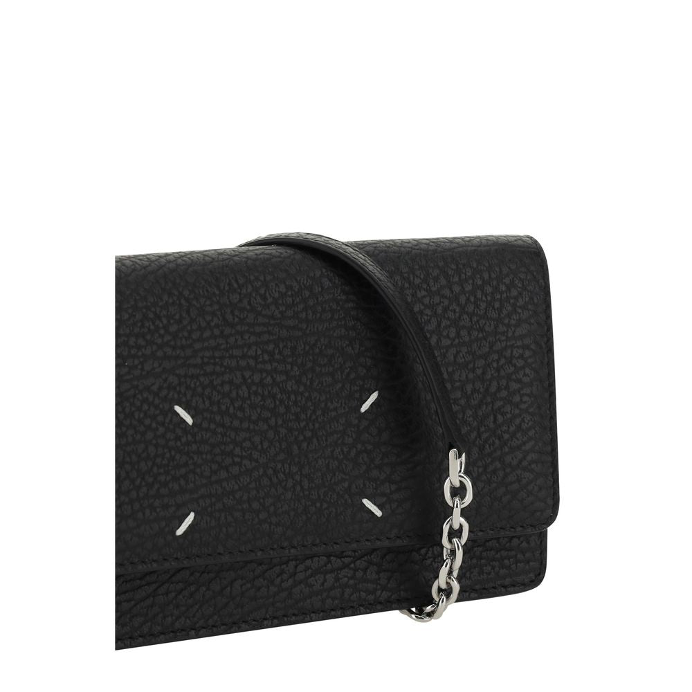 Experience the allure of the Maison Margiela Black Calf Leather Bos Taurus Wallet, a masterpiece of craftsmanship and sophistication, designed for the discerning individual.