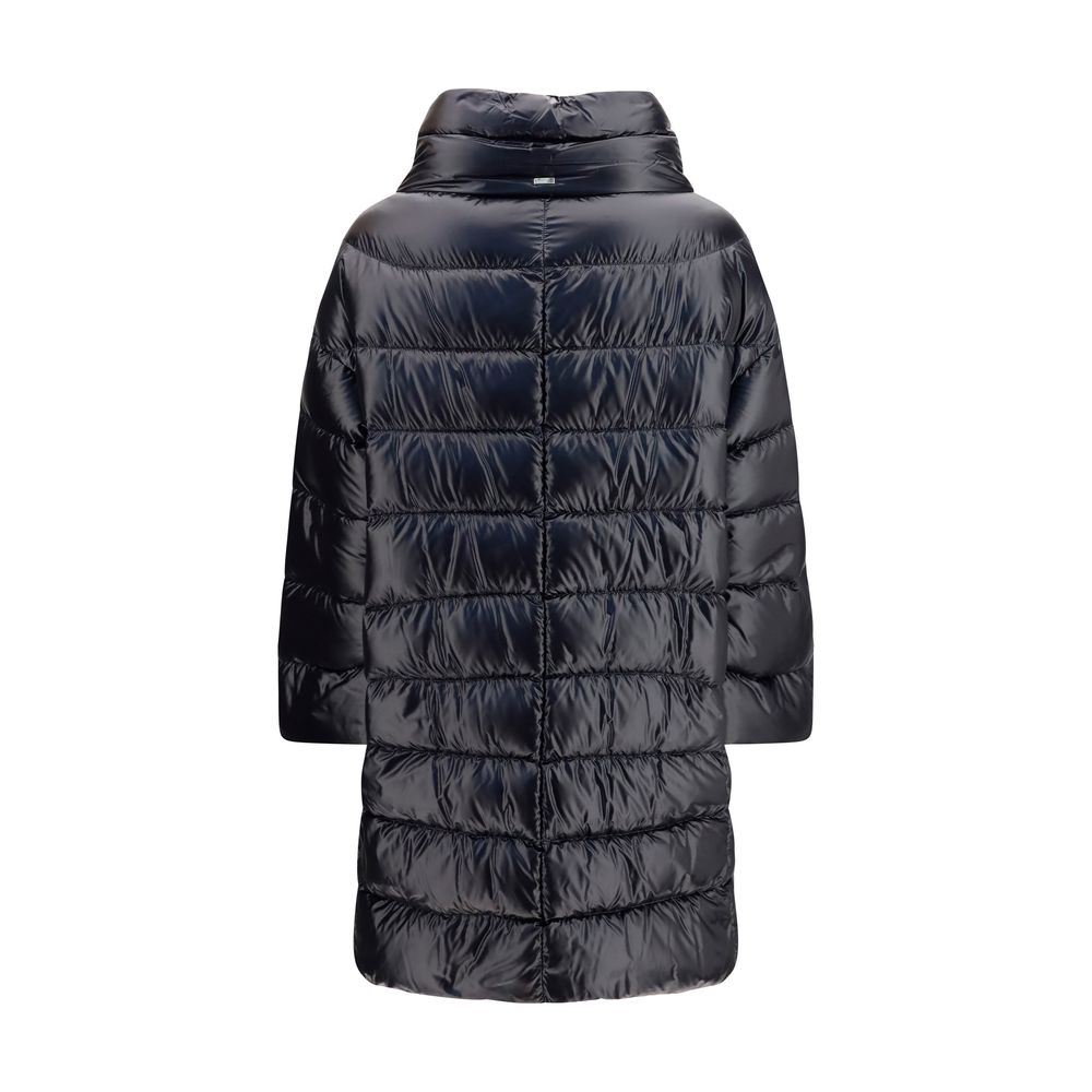 Elevate your winter elegance with the Herno Black Polyester Coat, a luxurious midi piece crafted from 100% polyester, embodying Italian sophistication and timeless allure.