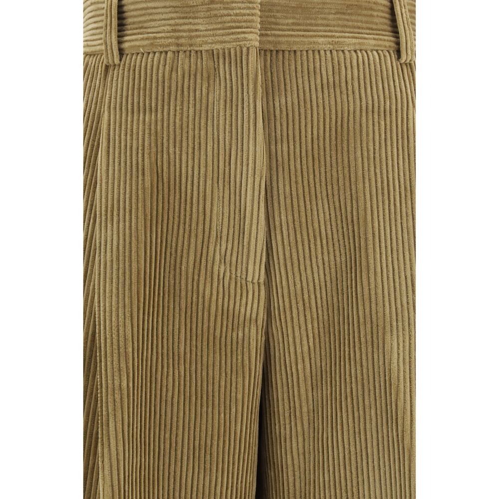 Elevate your wardrobe with Róhe Beige Cotton Flared Pants, crafted from luxurious cotton. Experience timeless elegance and sophisticated style for any occasion.