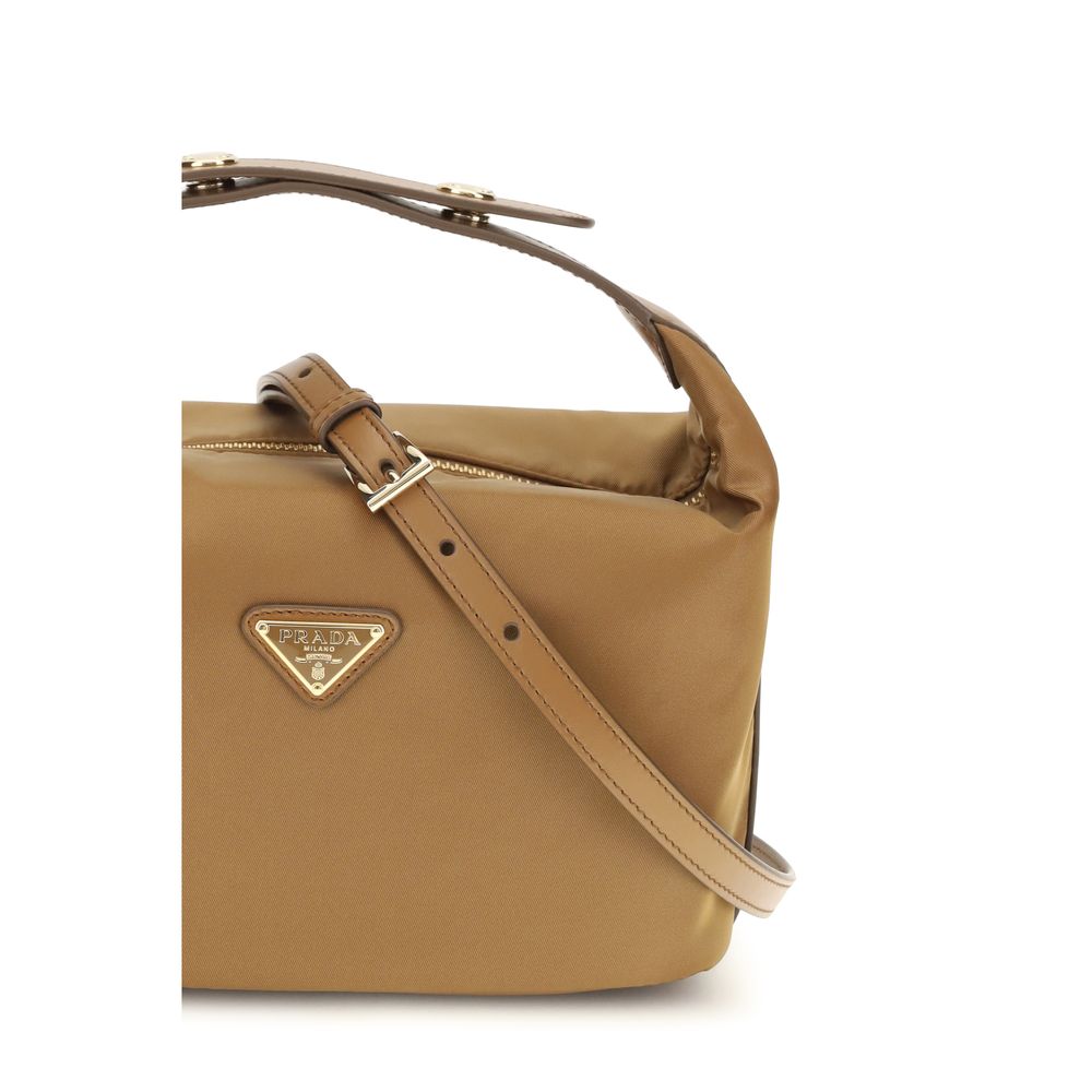 Elevate your style with the Prada Beige Recycled Polyamide Shoulder Bag, a masterpiece of sustainable luxury that seamlessly blends sophistication and functionality.