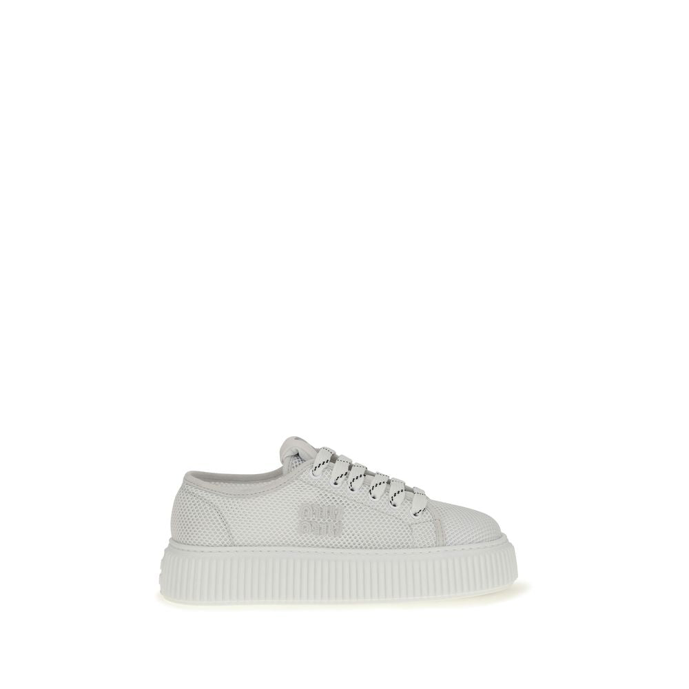 Elevate your style with Miu Miu White Polyamide Platform Sneakers, a luxurious blend of sporty elegance and contemporary design, crafted for the discerning modern individual.