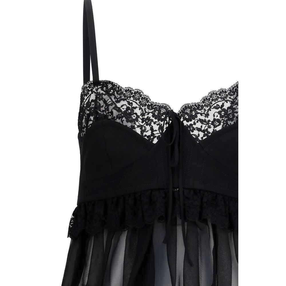 Indulge in the Chloé Black Silk Blouse from the AW26 collection, crafted from fluid organic silk for timeless elegance that elevates every sophisticated wardrobe.