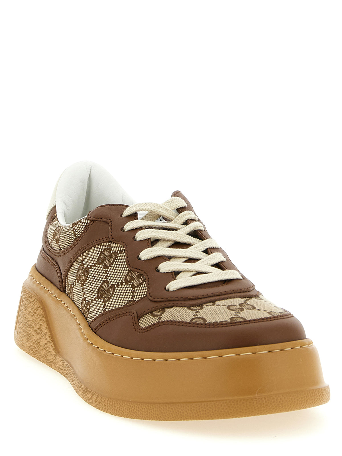 Step into unparalleled luxury with Gucci Brown Calfskin Chunky Sneakers, where exquisite craftsmanship meets bold design, elevating your style to new heights.