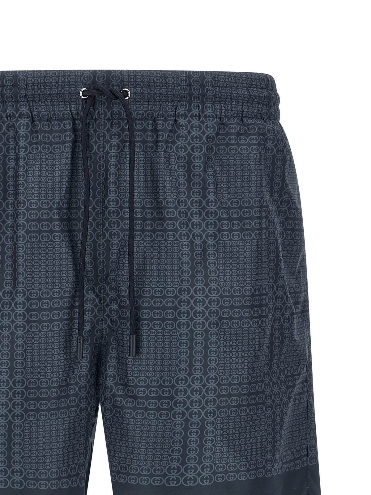 Elevate your swimwear collection with the Gucci Blue Polyester Swim Shorts, crafted from premium technical poplin, embodying luxury and style for discerning trendsetters.
