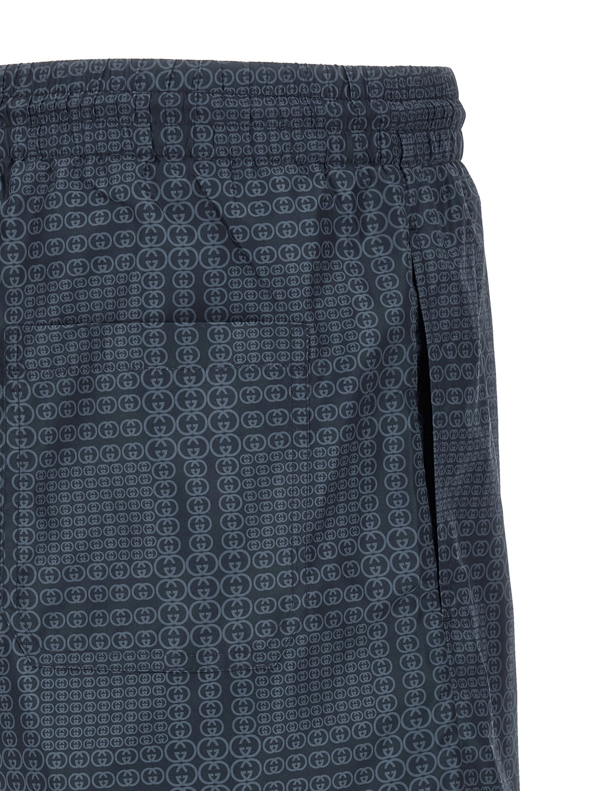 Elevate your swimwear collection with the Gucci Blue Polyester Swim Shorts, crafted from luxurious technical poplin, embodying sophistication and style for the discerning individual.