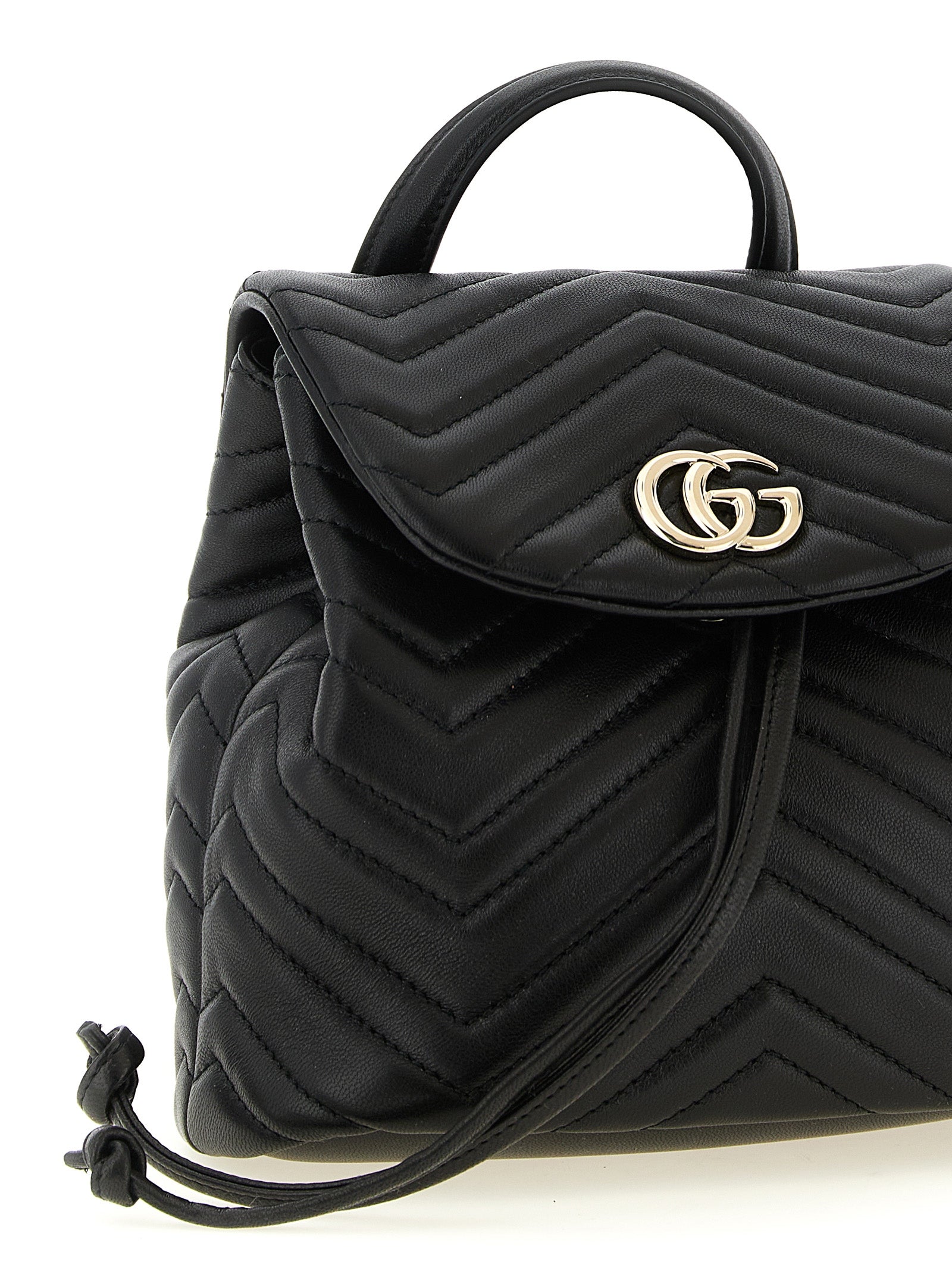 Discover the Gucci Black Lamb Leather Backpack from the iconic GG Marmont collection, where exquisite craftsmanship meets timeless elegance in luxurious lamb leather.