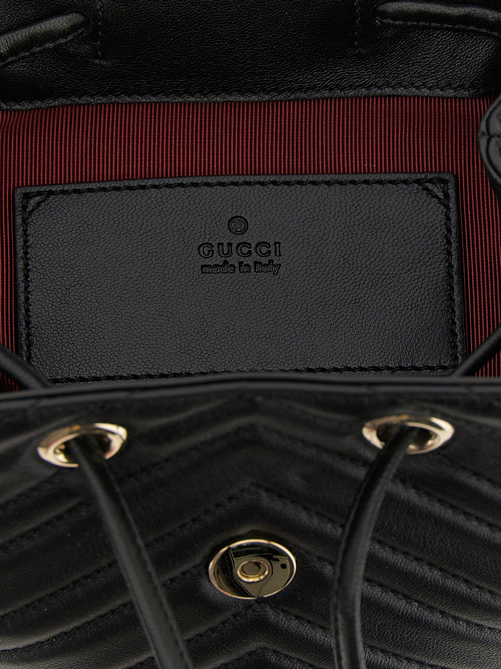 Discover the Gucci Black Lamb Leather Backpack from the GG Marmont collection, an exquisite blend of luxury and functionality crafted from sumptuous lamb leather, perfect for the discerning individual.